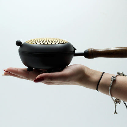 Grande incensário de ferro - detalhes dourados